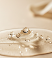 Large close-up of a creamy serum texture swatch